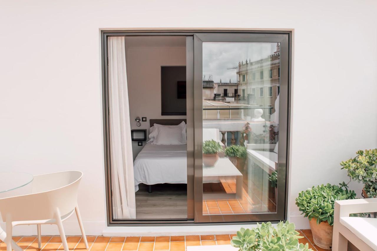 Puerta Catedral Holiday Suites Севилья Экстерьер фото